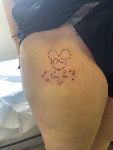 Explore black cat tattoo ideas, creative tattoo ideas in Orlando, available at Fine Ink Studios Tattoos