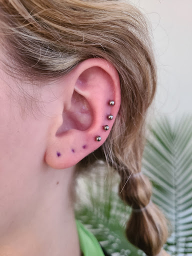 Explore ladies hand tattoo ideas, creative tattoo ideas in Nacogdoches, available at Primal Piercing & Jewelry