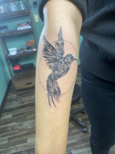 Explore simple dragon tattoo ideas, creative tattoo ideas in Wabash, available at Steel Rose Tattoo Studio