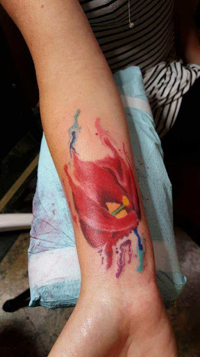 Explore smiley face tattoo ideas, creative tattoo ideas in Fort Dodge, available at Black Diamond Tattoo Studio