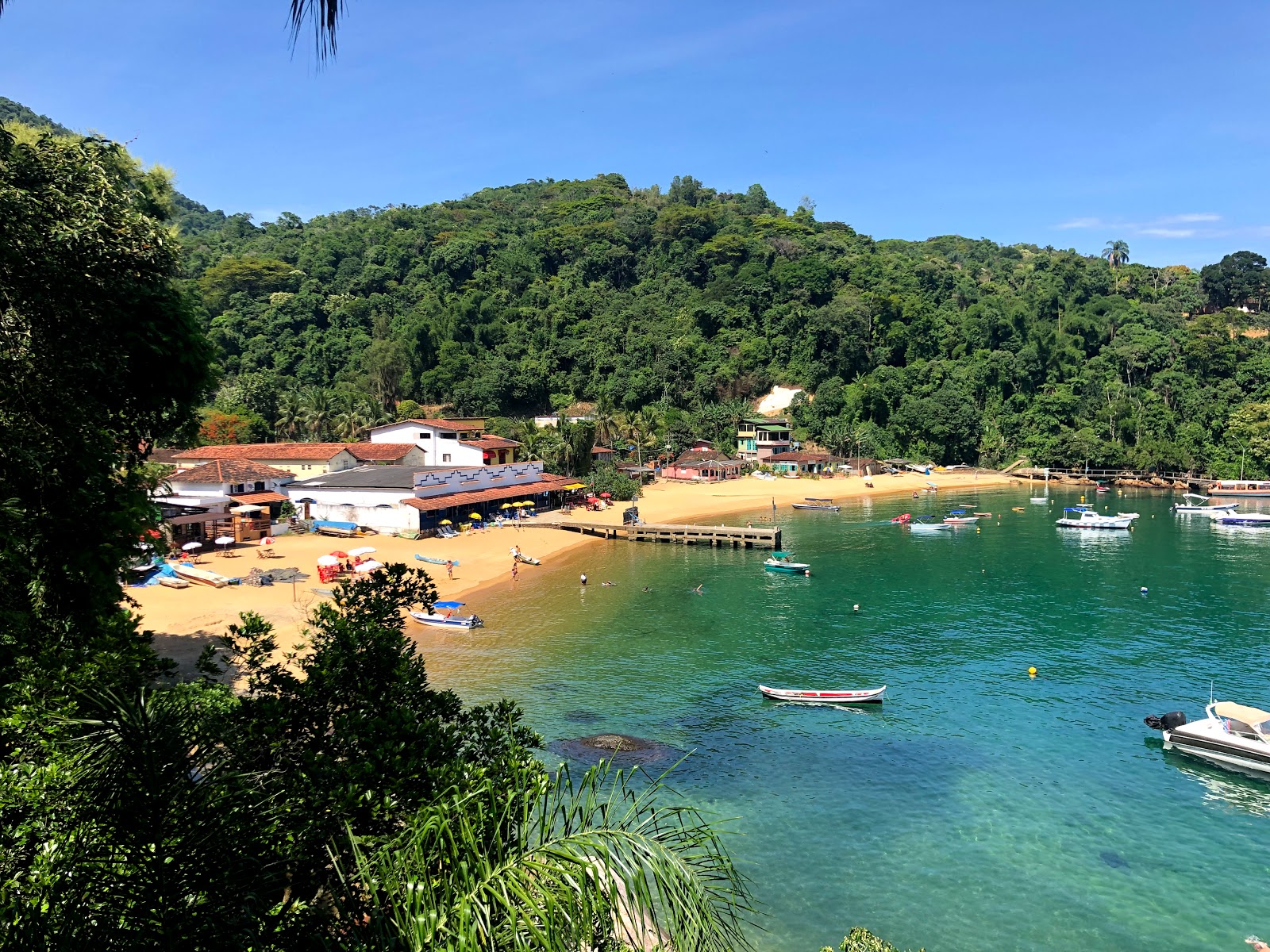 Fotografie cu Praia Vermelha cu o suprafață de nisip strălucitor