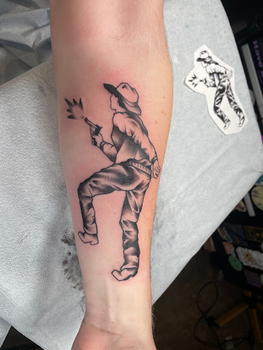 Explore leg tattoo cover up ideas for men, creative tattoo ideas in Athens, available at Pink Goblin Tattoo & Piercing