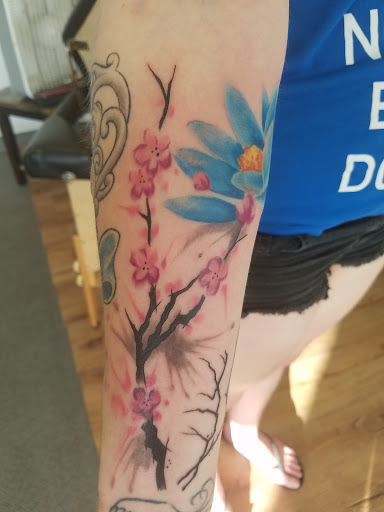 Explore growth tattoo ideas, creative tattoo ideas in Pocatello, available at Black Sheep Tattoo