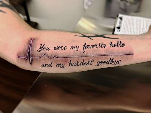 Explore tattoo cover up ideas for forearm, creative tattoo ideas in Roscoe, available at Elevated Ink Tattoo