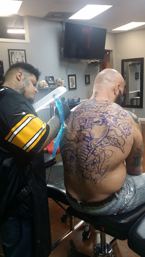 Explore rain tattoo ideas, creative tattoo ideas in Arlington, available at Urbans Tattoo & Piercing Studio