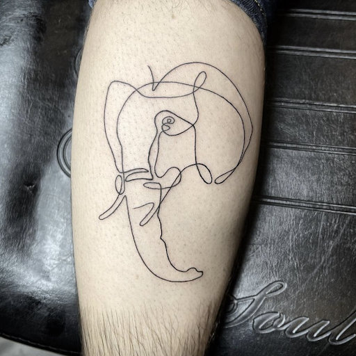 Explore tattoo ideas on the thigh, creative tattoo ideas in Miami Beach, available at Tattoos by Lou Miami - South Beach