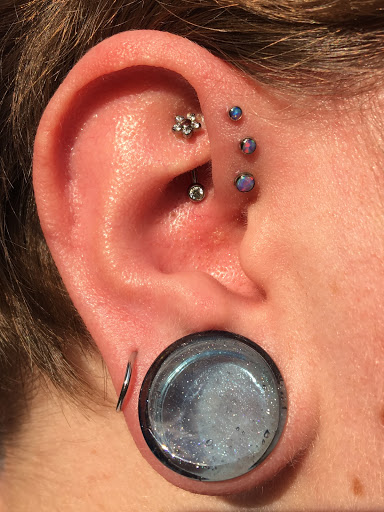 Explore amethyst tattoo ideas, creative tattoo ideas in Bloomington, available at Evil by the Needle Custom Tattoo and Piercing Studio