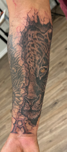 Explore forearm tattoo name ideas, creative tattoo ideas in Elko, available at Freedom Tattoo