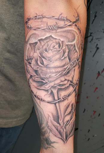Explore heartbreak tattoo ideas, creative tattoo ideas in Johnson City, available at Defiant Designs