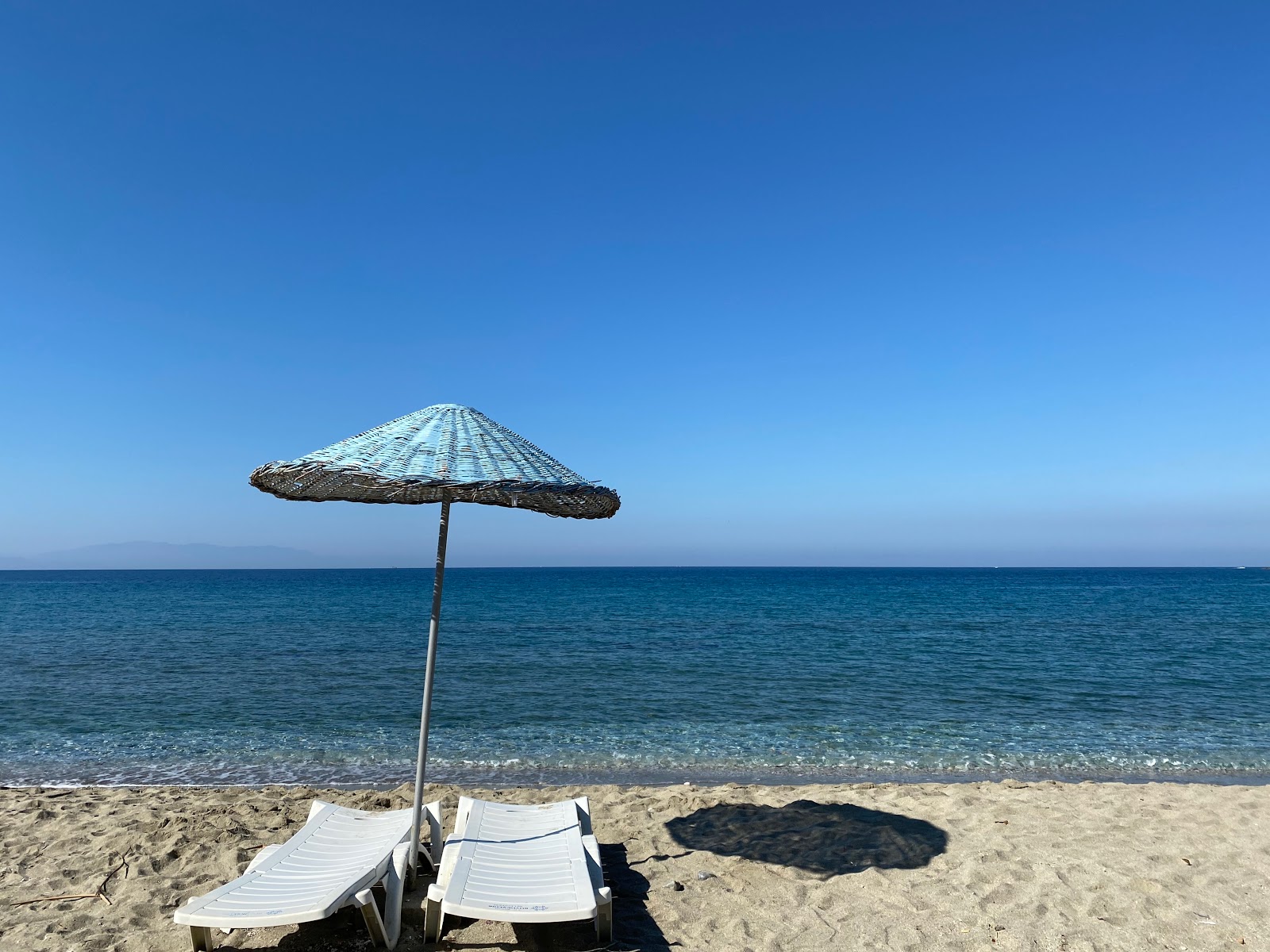 Foto von Pigale Strand und die siedlung