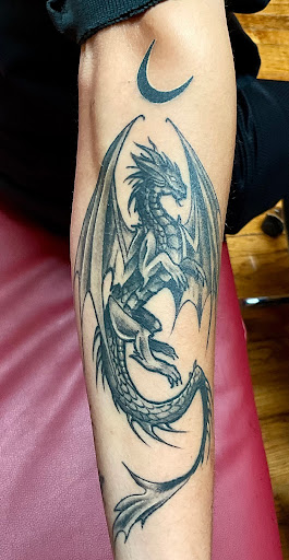 Explore forearm sleeve tattoo ideas for men, creative tattoo ideas in Rapid City, available at Elegant Ink Tattoos And Piercings