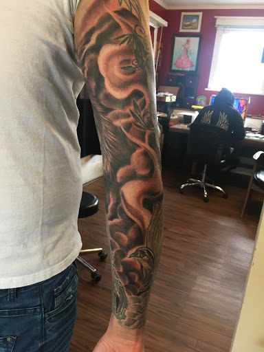 Explore feminine energy tattoo ideas, creative tattoo ideas in Milford, available at Golden Hammer Tattoo Studios