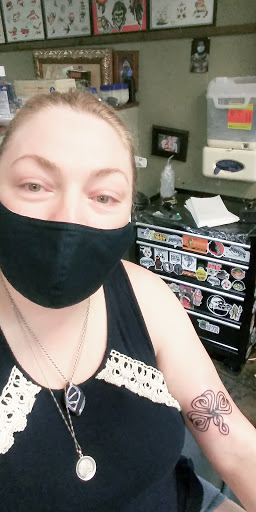 Explore back shoulder tattoo ideas for men, creative tattoo ideas in Massillon, available at Eulogy Tattoo