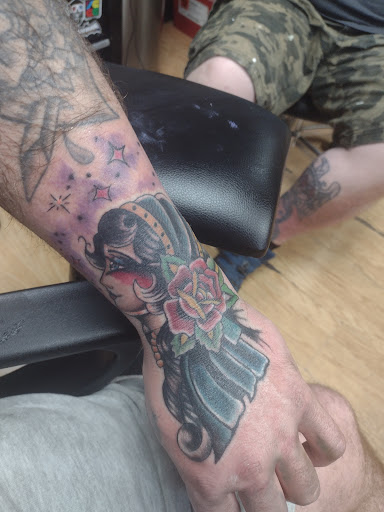 Explore venom tattoo ideas, creative tattoo ideas in Cheltenham, available at Louder Than Bombs Tattoo