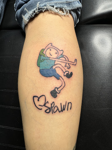 Explore lightsaber tattoo ideas, creative tattoo ideas in Olympia, available at Bigfoot Tattoo & Piercing