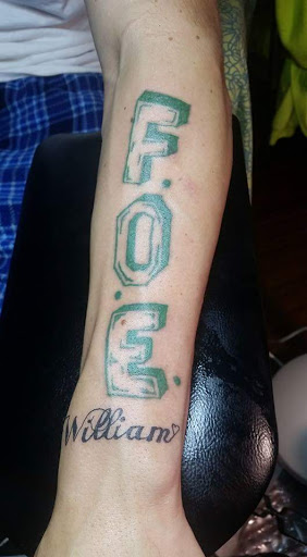 Explore hood tattoo ideas, creative tattoo ideas in Davis, available at SIX GUN SOUND TATTOO