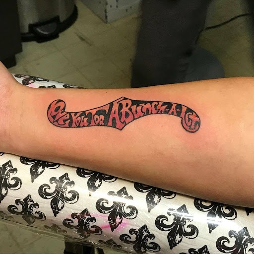 Explore black wolf tattoo ideas, creative tattoo ideas in Bowling Green, available at Taboo Tattoos and Piercings