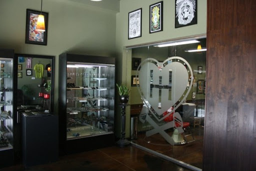 Explore leg sleeve tattoo ideas for guys, creative tattoo ideas in Des Moines, available at Iron Heart Tattoo