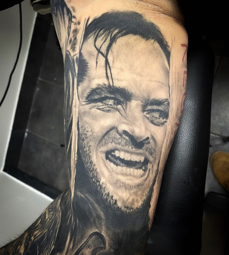 Find tummy tuck scar tattoo ideas for your next unique tattoo in Buffalo at True Gloom Tattoo Studio