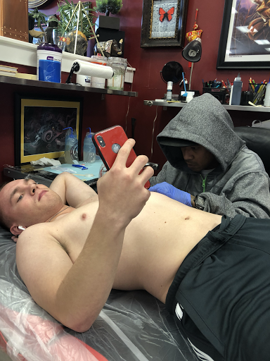 Explore skate tattoo ideas, creative tattoo ideas in Katy, available at Artistic Impressions Tattoo Studio