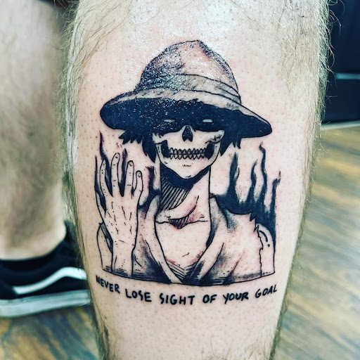 Explore tattoo ideas on ribs for guys, creative tattoo ideas in Warren, available at Aces Tattoo & Body Piercing