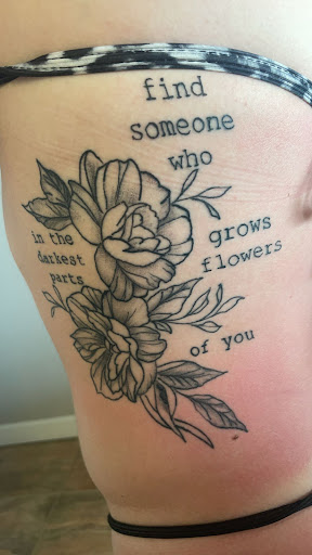 Explore dog print tattoo ideas, creative tattoo ideas in Elkhart, available at Legendary Ink Tattoo and Piercing Studio