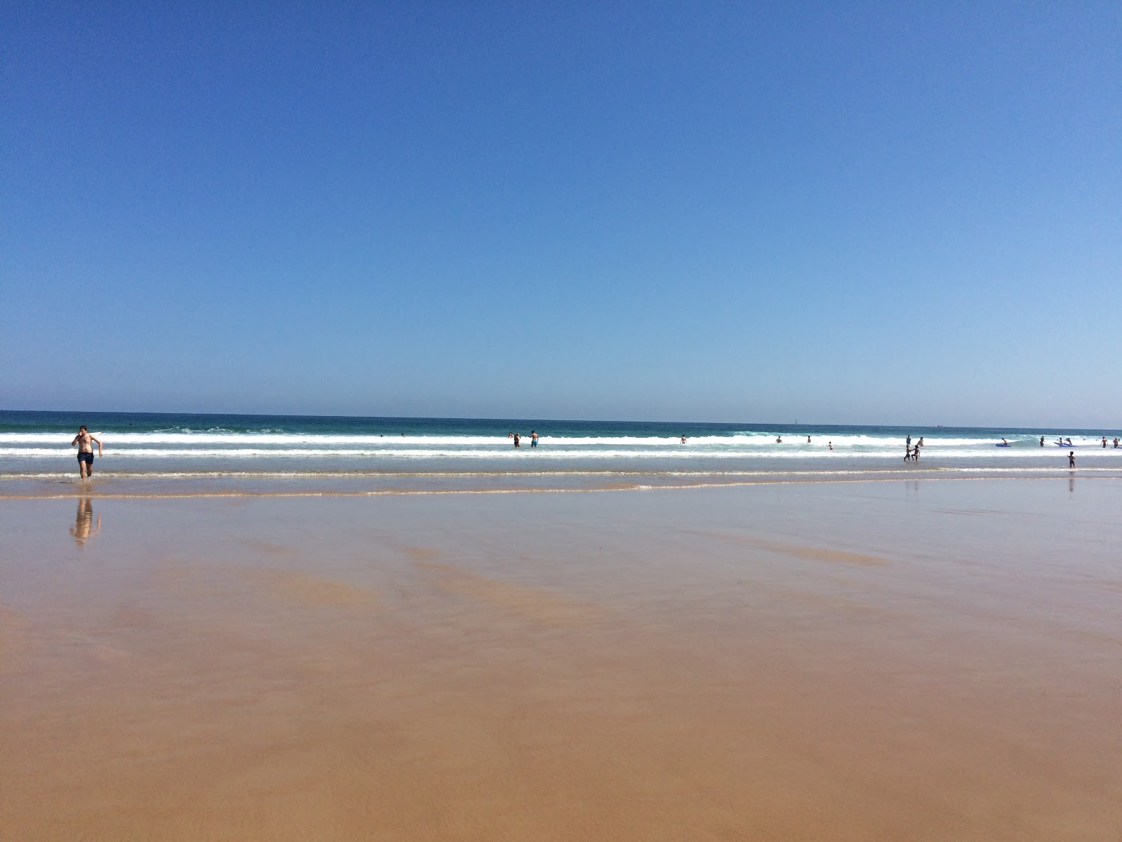 Foto von Berria Strand und die siedlung