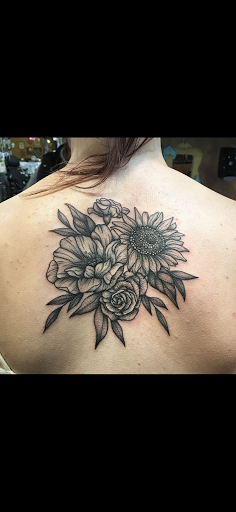 Explore dart tattoo ideas, creative tattoo ideas in Sioux Falls, available at Permanent Addictions
