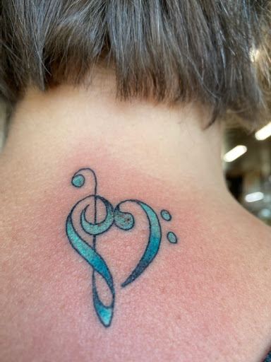 Explore brain tumor tattoo ideas, creative tattoo ideas in Modesto, available at The Golden Rose Tattoo