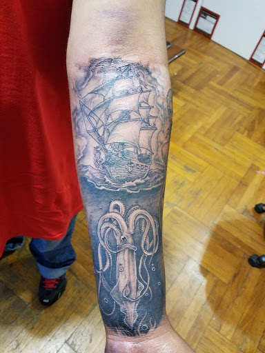 Explore tattoo ideas for young men, creative tattoo ideas in Bronx, available at Dudes Tattoos
