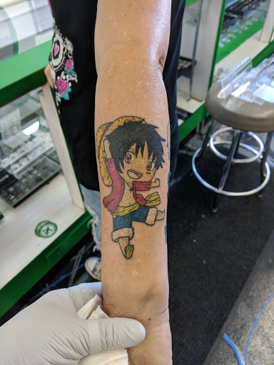 Explore calf muscle tattoo ideas, creative tattoo ideas in Redding, available at Caddy Daddys