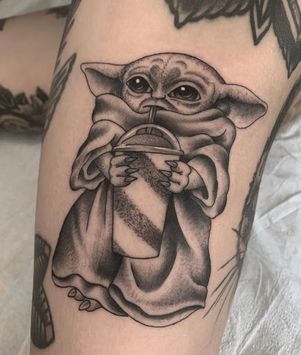 Explore lower back tattoo cover up ideas, creative tattoo ideas in Edgewood, available at Wild Coyote Tattoo