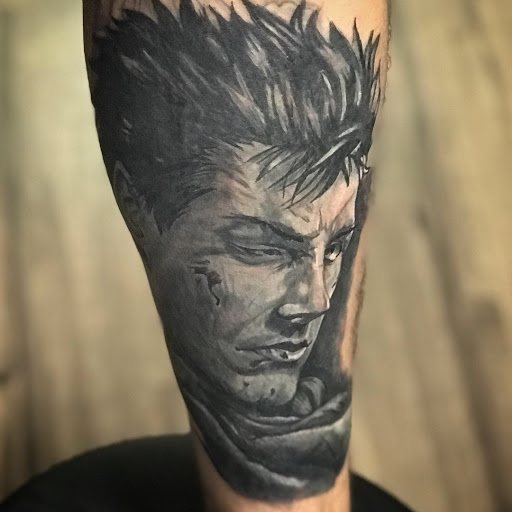 Explore flower back tattoo ideas, creative tattoo ideas in Atlanta, available at Golden Anchor Tattoo