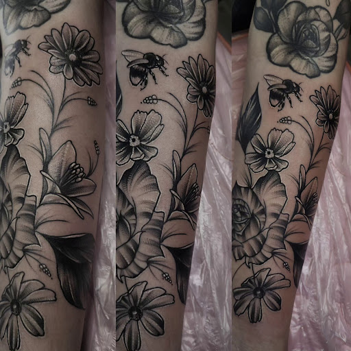 Explore women half sleeve tattoo ideas, creative tattoo ideas in Valdosta, available at Acid Ink Tattoos