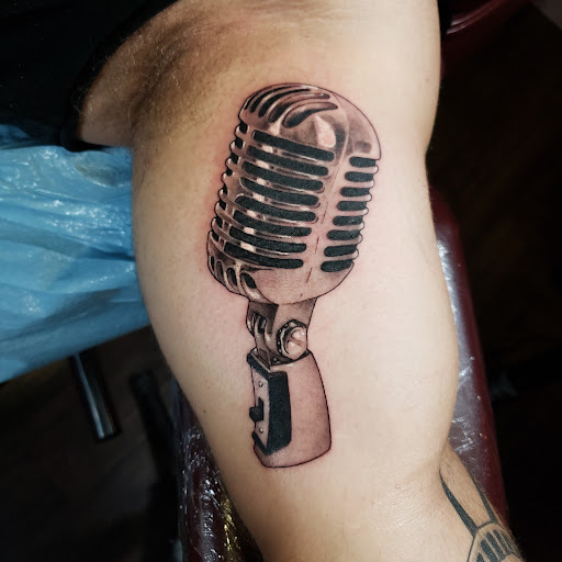 Explore 2 percent tattoo ideas, creative tattoo ideas in Roanoke, available at Imagine Ink Studios