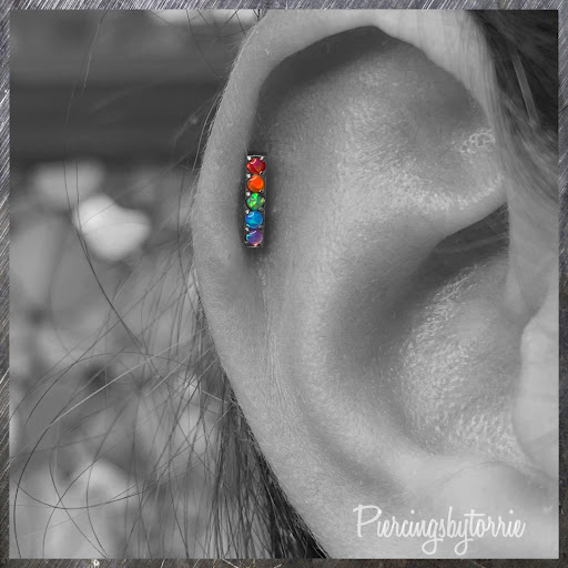 Explore back of ear tattoo ideas, creative tattoo ideas in Fort Walton Beach, available at Piercings by Torrie