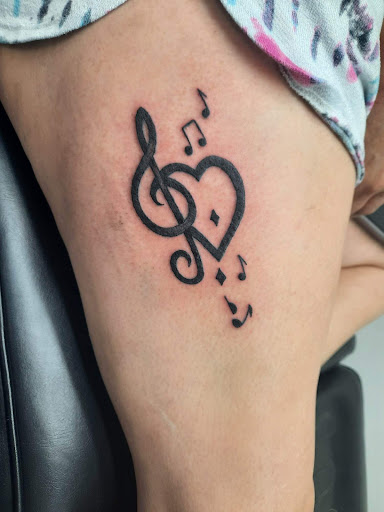 Explore blue flame tattoo ideas, creative tattoo ideas in Salem, available at Outwest Tattoo and body piercing ,30 years of tattooing,only life time guarantee