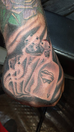 Explore tattoo ideas shoulder, creative tattoo ideas in Angola, available at Hoodlum Ink