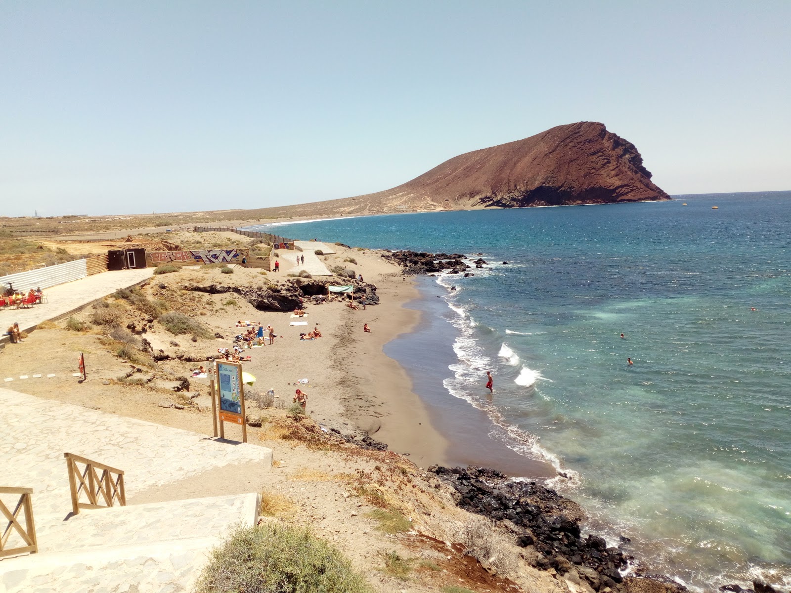 Foto van Playa de Sotavento met bruin zand oppervlakte