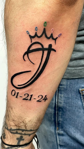 Explore snake tattoo ideas for females, creative tattoo ideas in Butler, available at Red Parlour Tattoo & Piercing NJ