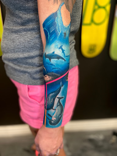 Explore finger tattoo ideas, creative tattoo ideas in Mesa, available at Next Wave Tattoos and Piercings