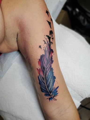 Explore tattoo ideas sports, creative tattoo ideas in Stamford, available at KE Tattoo Studio