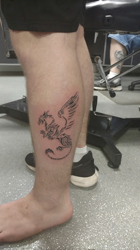 Explore tattoo ideas for guys on chest, creative tattoo ideas in Minerva, available at Wicked Tattooz