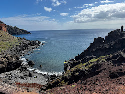 Praia do Sardinha'in fotoğrafı dağlarla çevrili