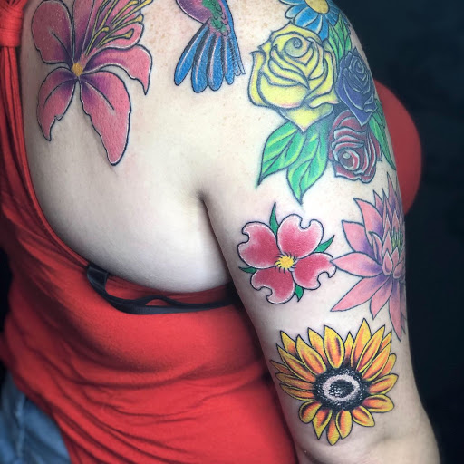 Explore wind tattoo ideas, creative tattoo ideas in Sanford, available at Hudson & Company Tattoo Studio