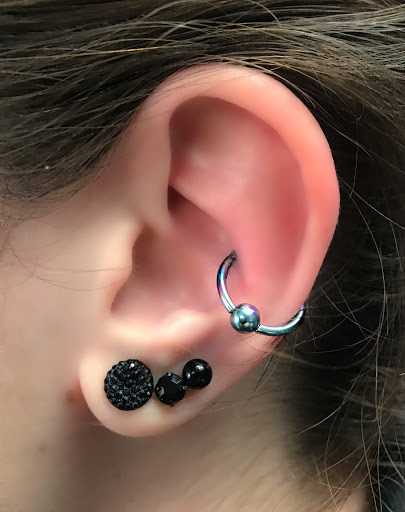 Explore cool back tattoo ideas, creative tattoo ideas in Springfield, available at Body Piercing By Qui Qui