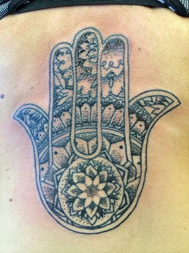 Explore skier tattoo ideas, creative tattoo ideas in Muncie, available at The Tattoo Studio