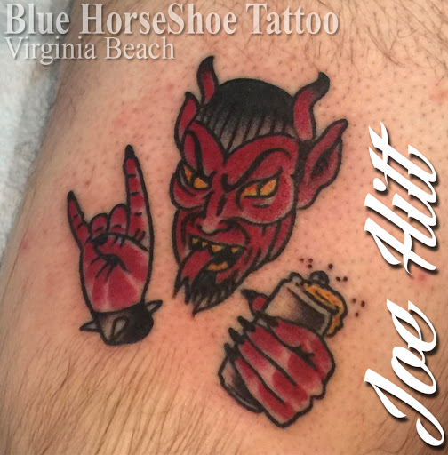Explore throat tattoo ideas for females, creative tattoo ideas in Virginia Beach, available at World Famous Blue Horseshoe Tattoo and Piercing Independence