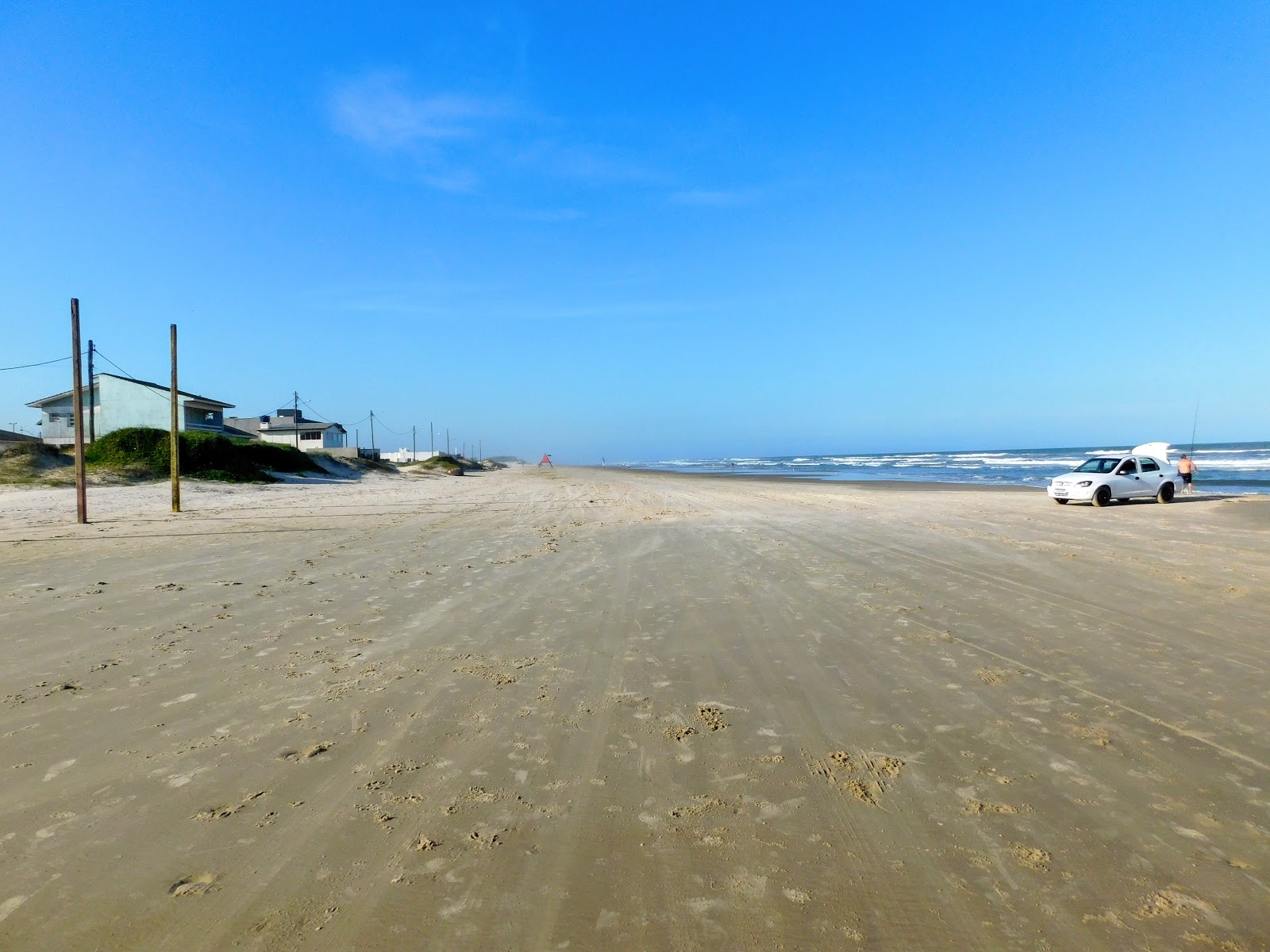 Praia de Atlantida'in fotoğrafı - rahatlamayı sevenler arasında popüler bir yer