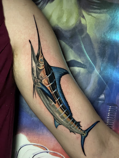 Explore survivor tattoo ideas, creative tattoo ideas in Greensboro, available at Tried and True Tattoo Company